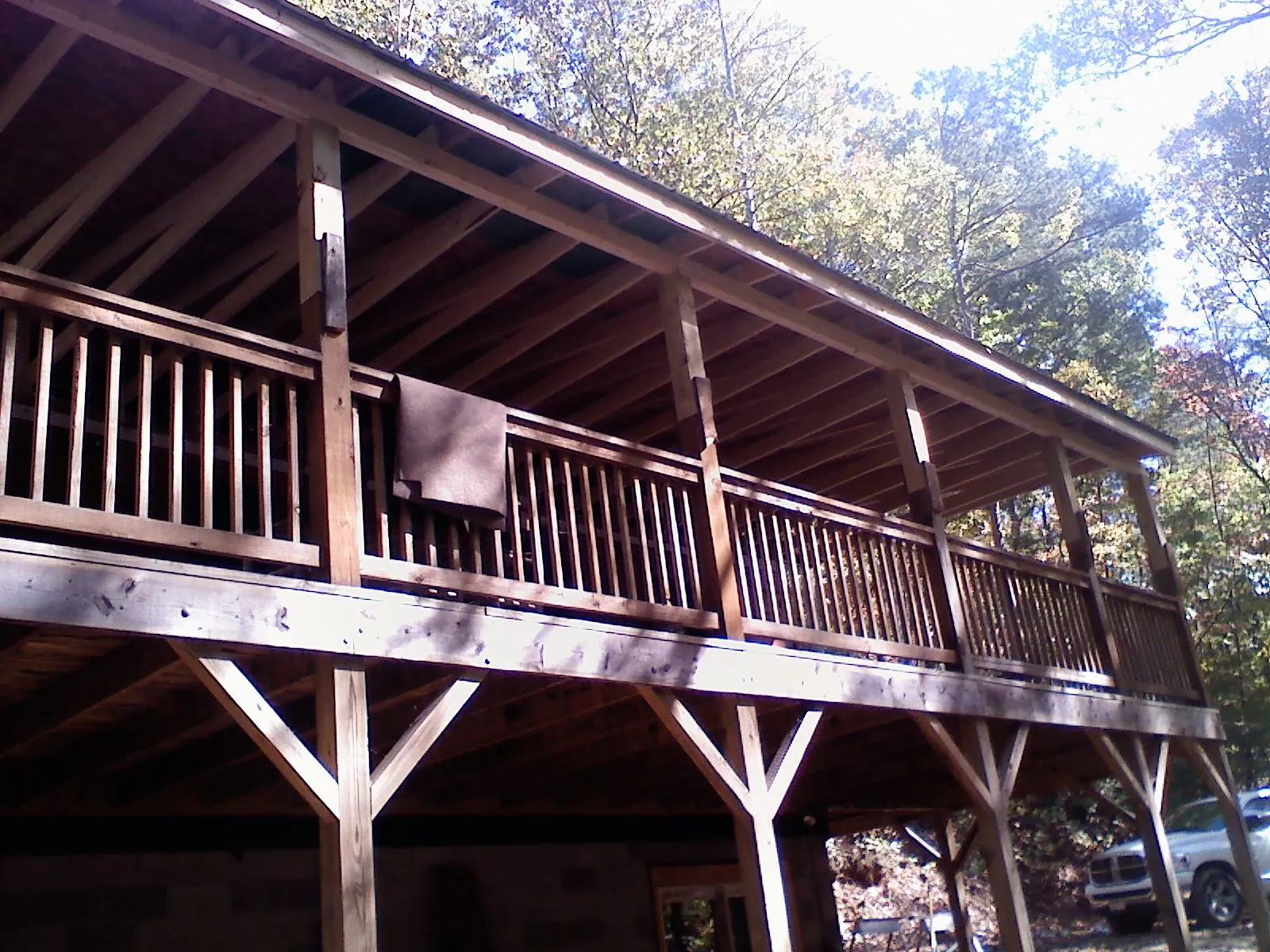 Timber framing under a new elevated porch and deck — Roof Leak Repair in Pescadero by Roofing Brothers